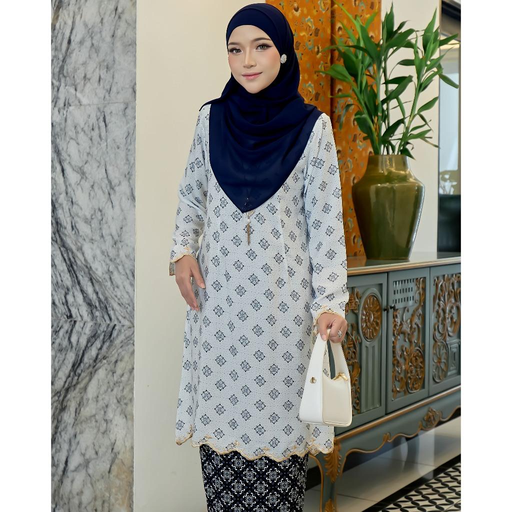 Evaline Kurung