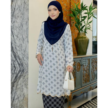 Evaline Kurung