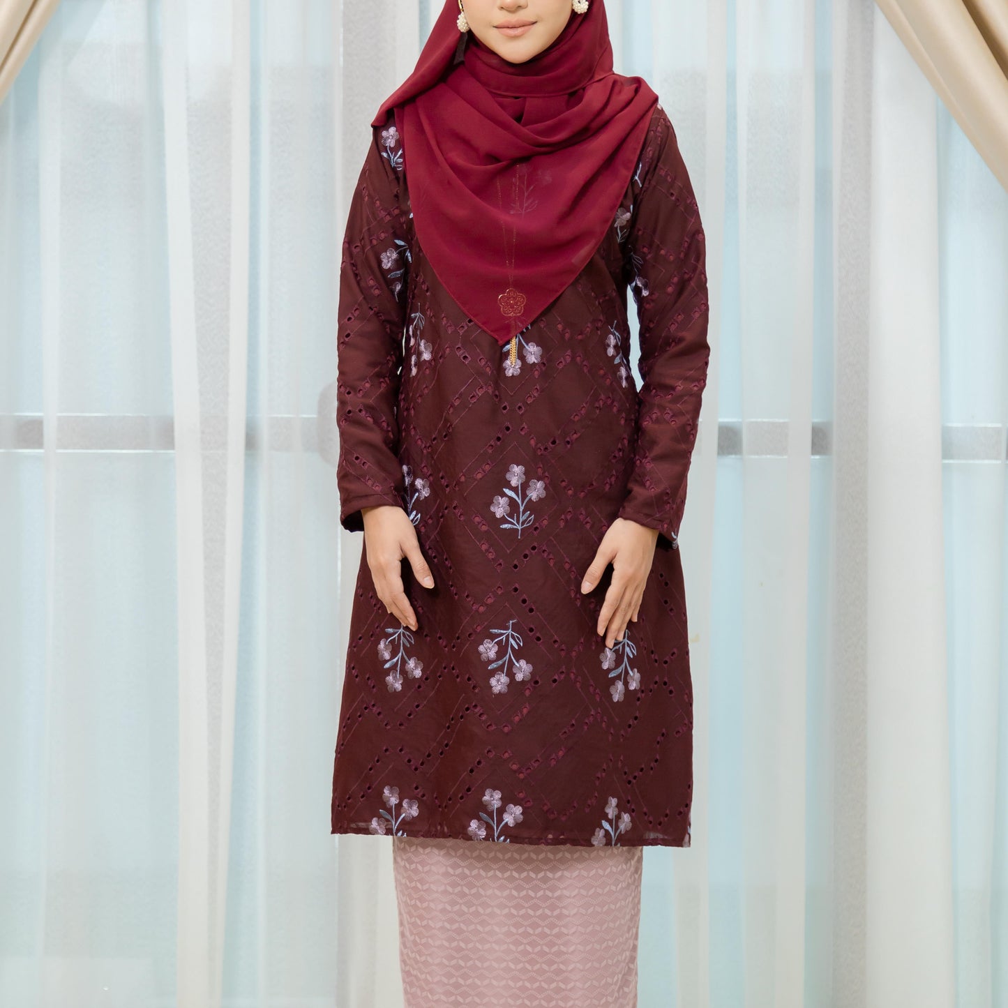 Emberly Kurung