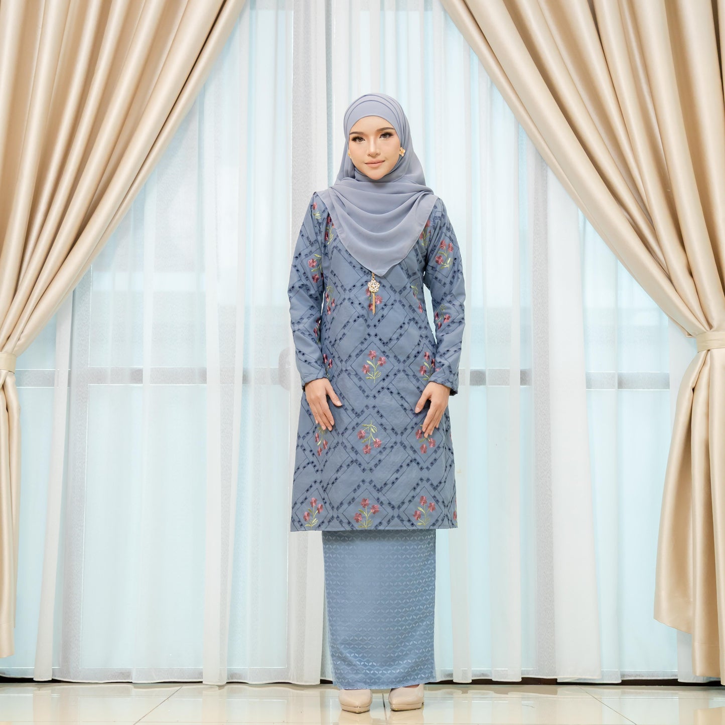 Emberly Kurung