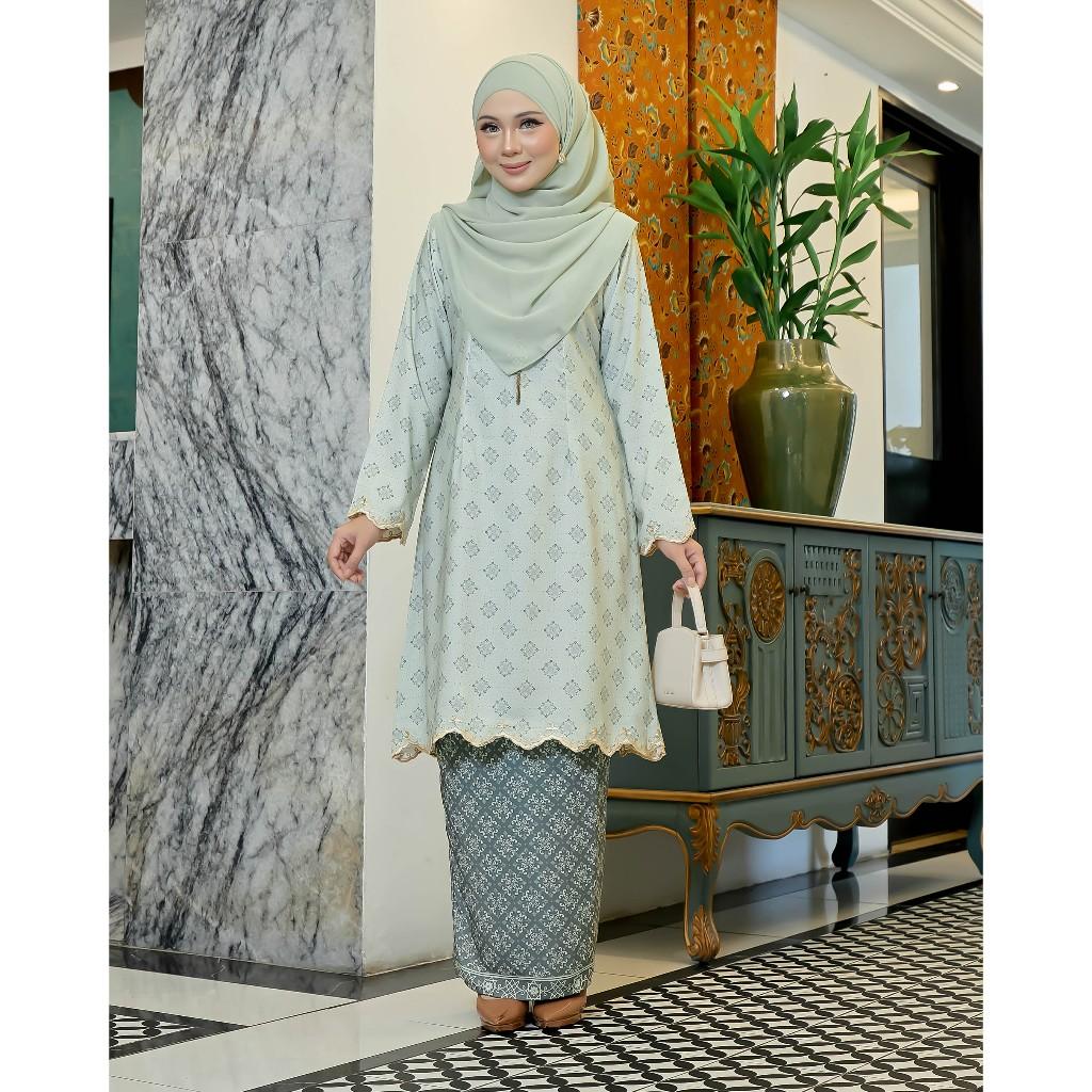 Evaline Kurung