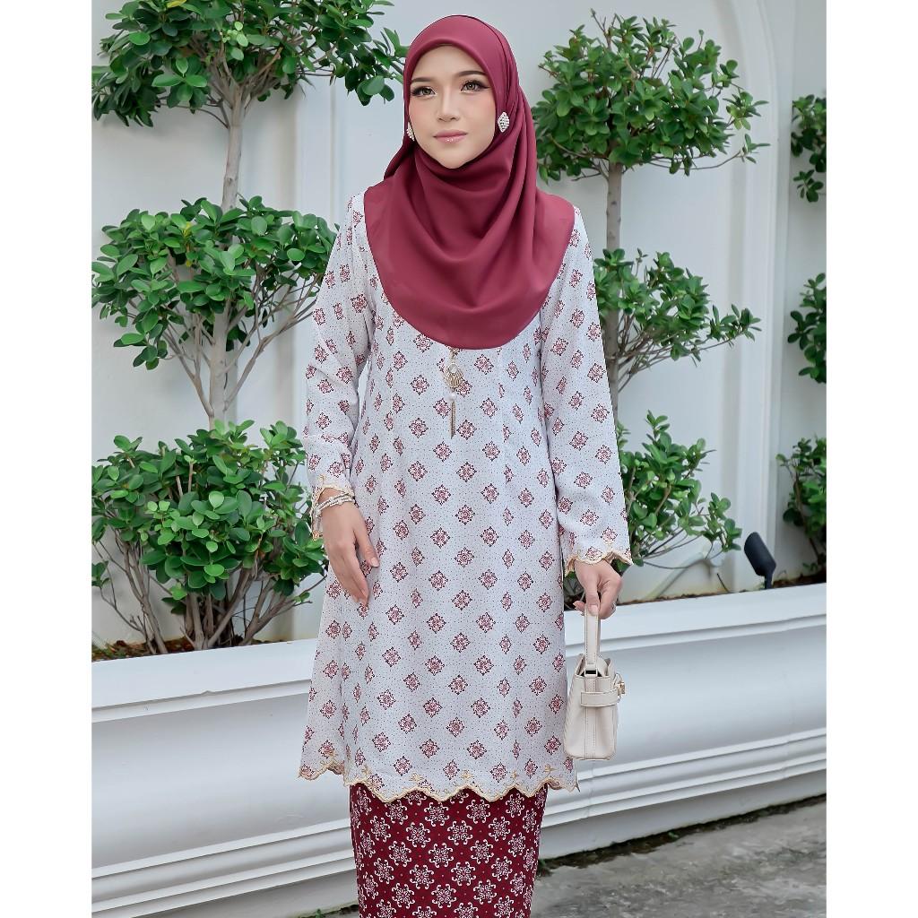 Evaline Kurung