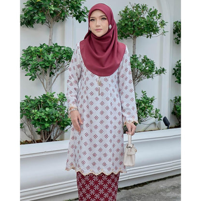 Evaline Kurung