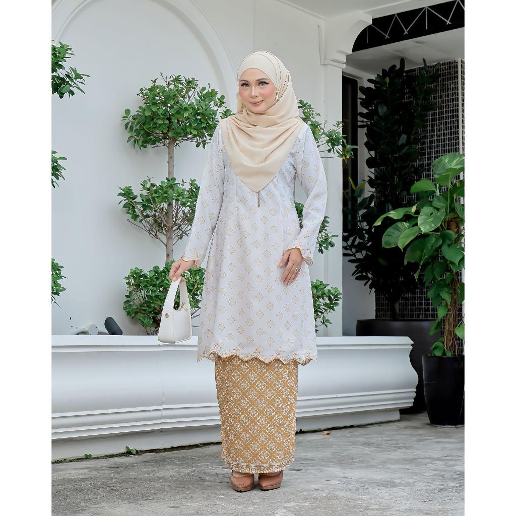 Evaline Kurung